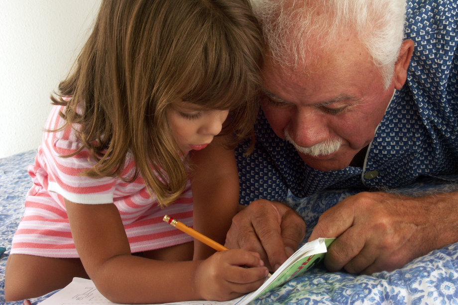 Retiree tutoring young child